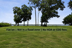 … while the flat homesite sits outside the flood zone, with no HOA or CDD fees.