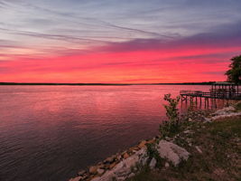 Then return home to sweeping water views and sunsets that make every day feel extraordinary.