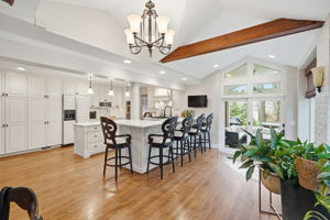 Renovated Kitchen with Breakfast Bar & access to Flagstone Patio