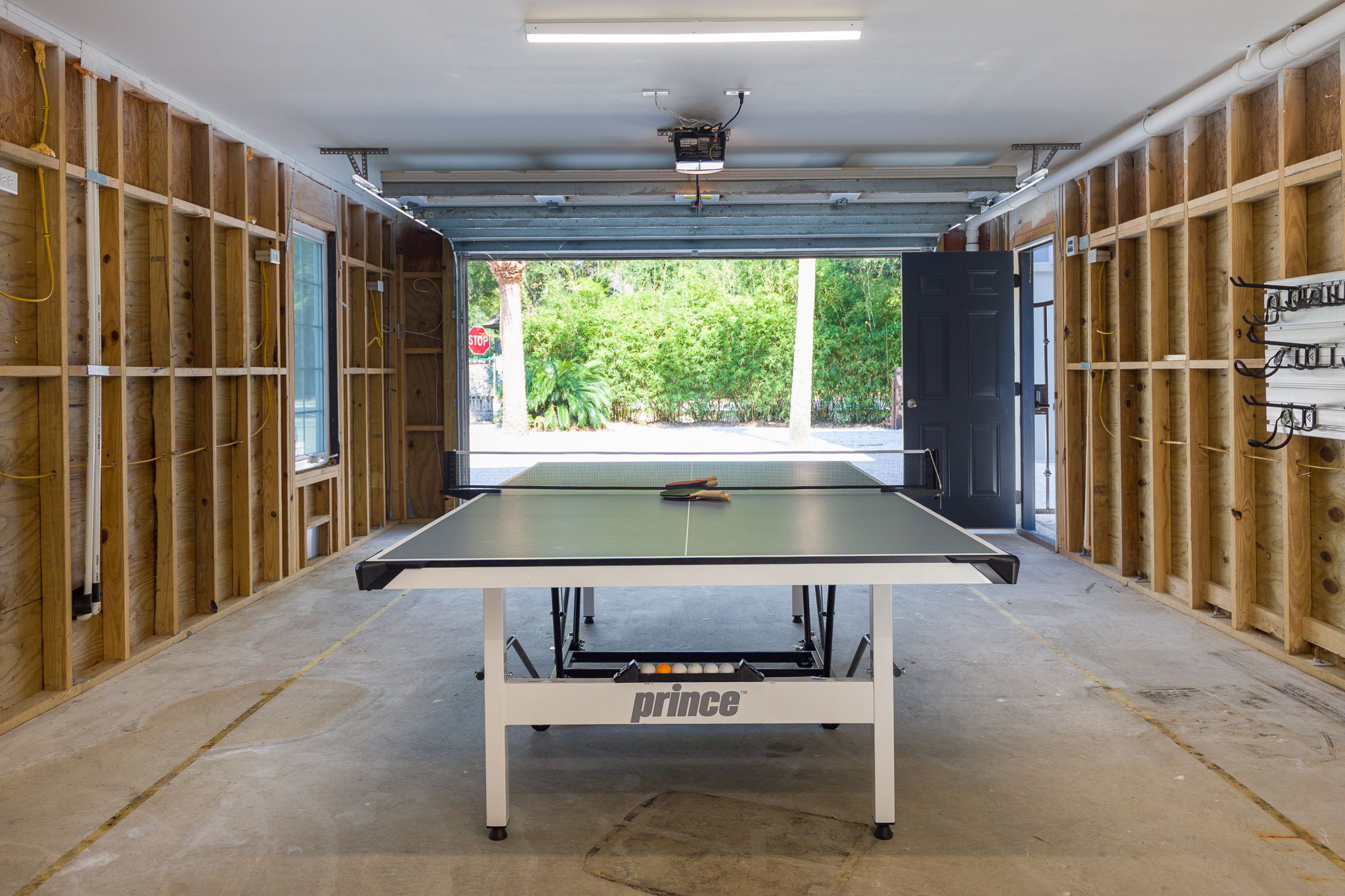 A third garage is currently being used as a Games Room.