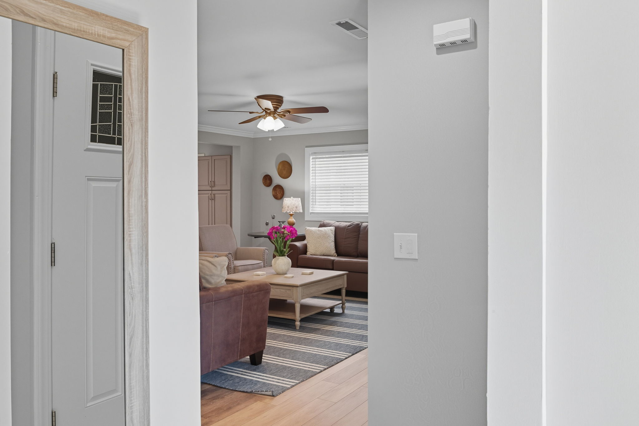 Hallway off the living room leads to the Teen Annex.