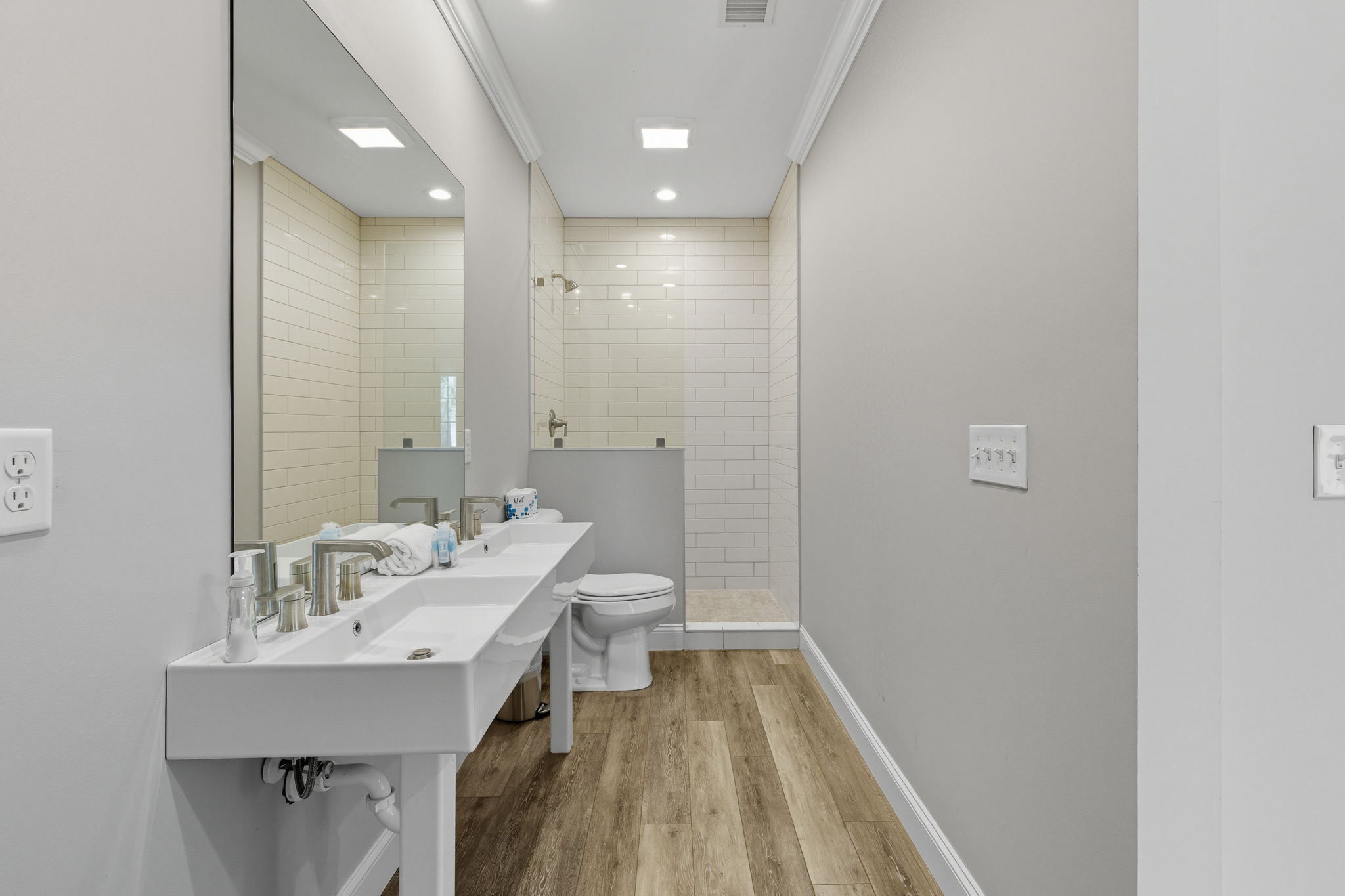 Double vanity and walk in shower in the Teen Annex bathroom.