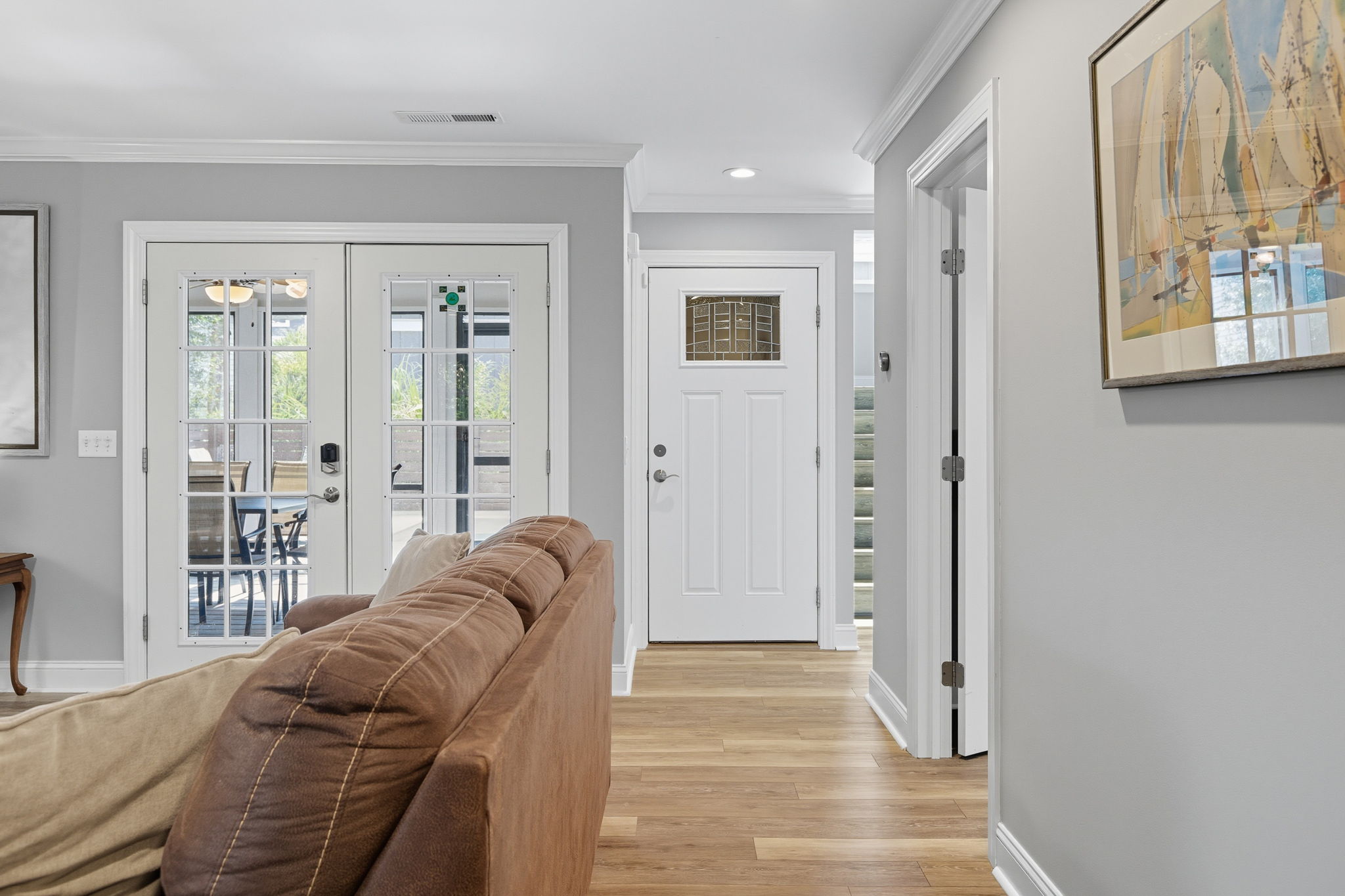 View of French Doors leading to screened in porch.