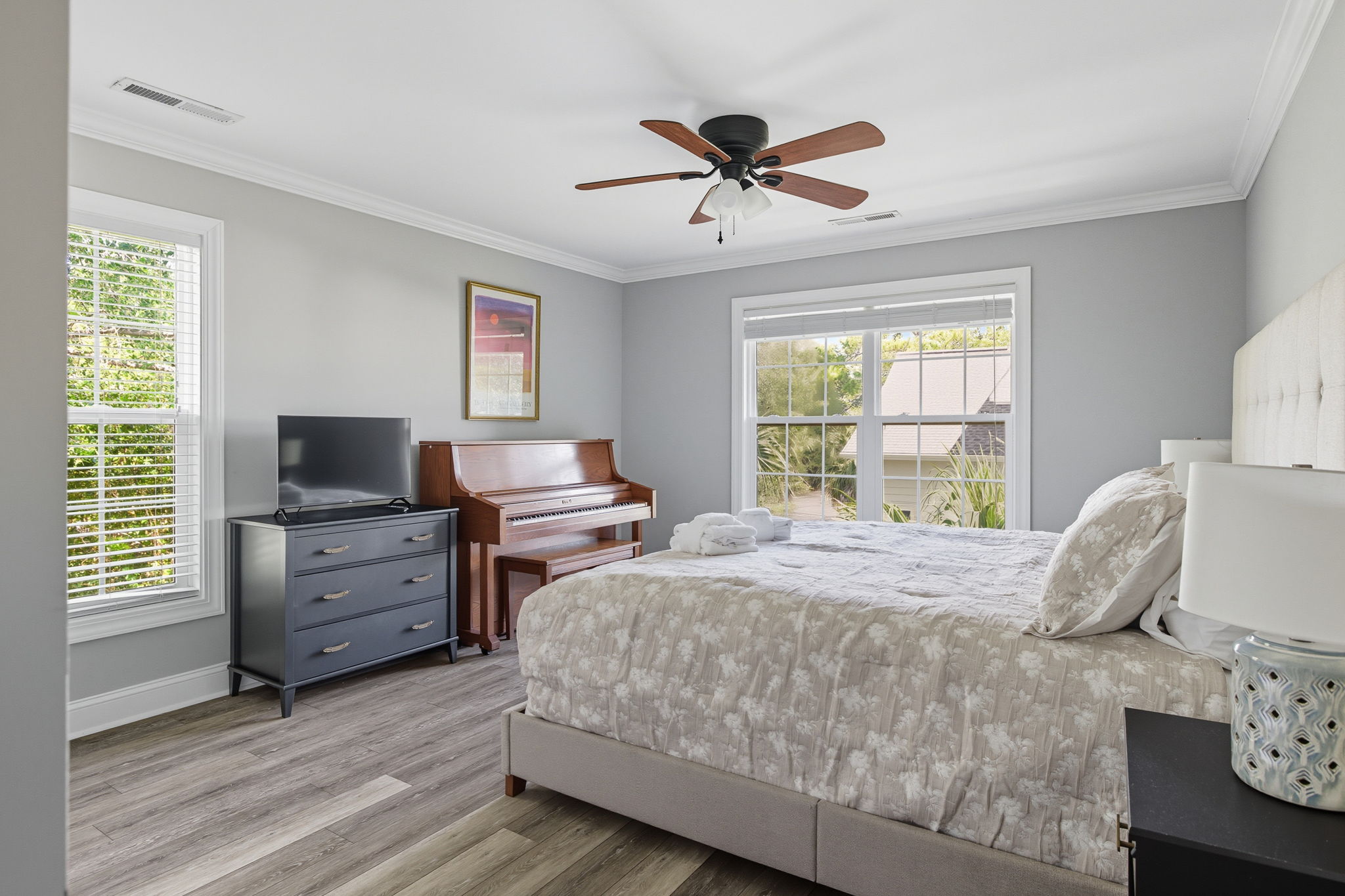 A sunny King bedroom is in the In-law/nanny suite.