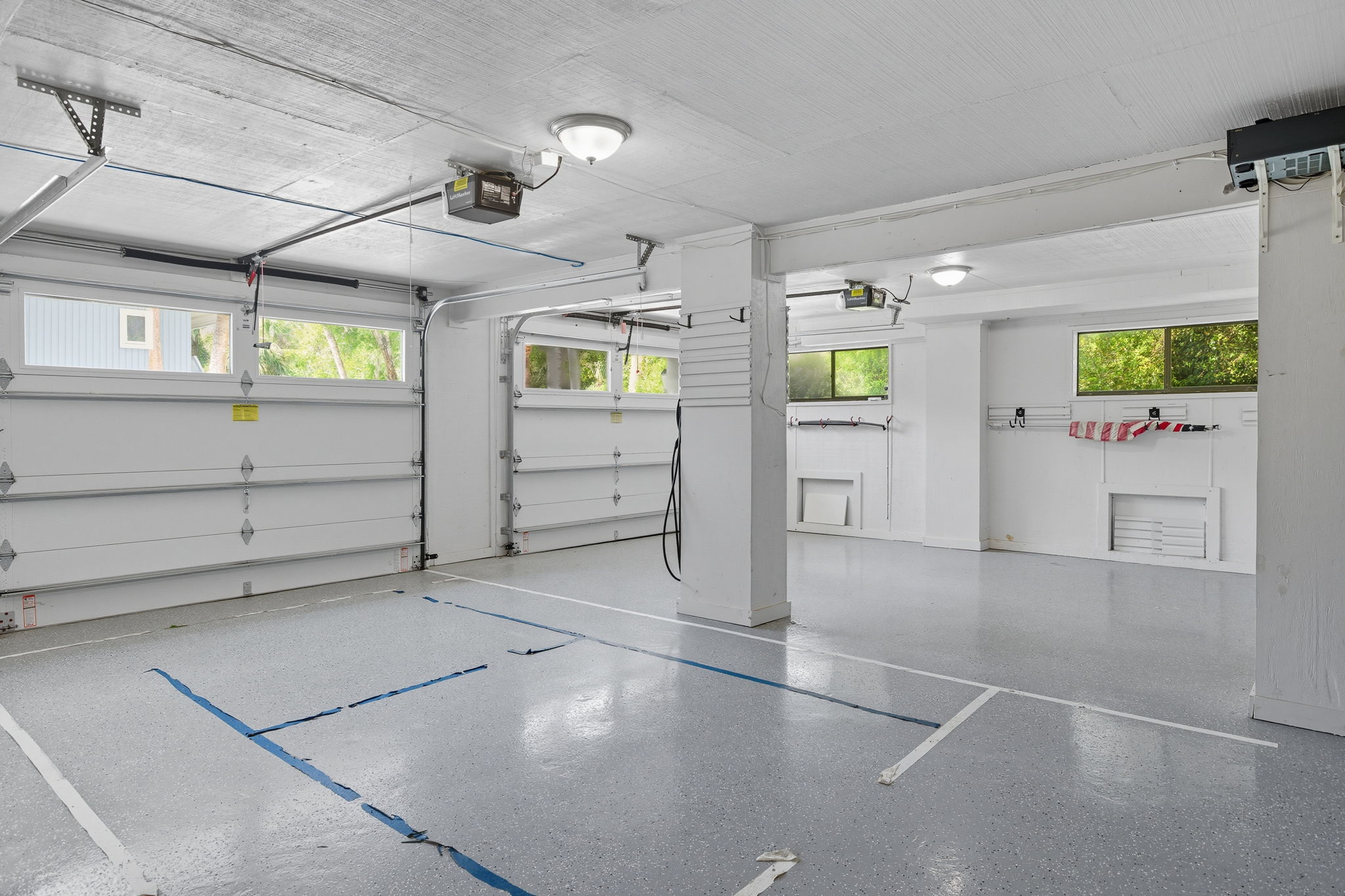 A two-car garage w/ plenty of storage underneath the house.