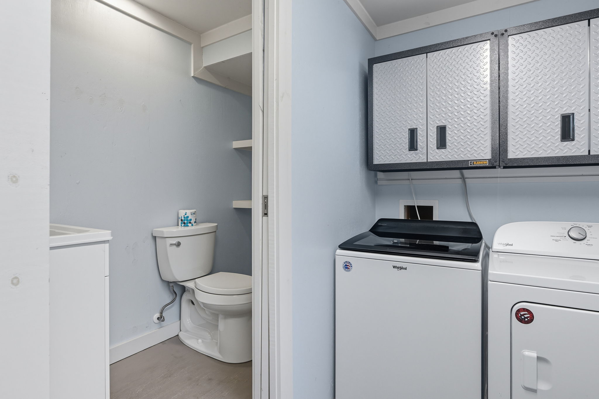 A full-size washer and dryer and bathroom is in the Man Cave.