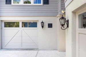 Exterior and garage space for 3 cars.