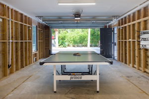 A third garage is currently being used as a Games Room.