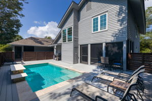 Pool has plenty of chaise lounges for sunning; outdoor grill too.