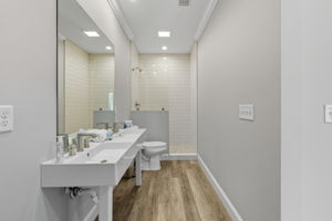 Double vanity and walk in shower in the Teen Annex bathroom.