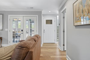 View of French Doors leading to screened in porch.