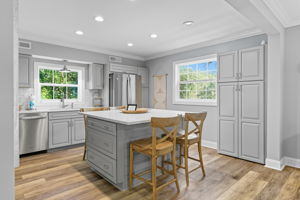 Charming, easy-flow Kitchen is well-equipped and light.