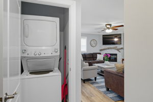 Stackable laundry right outside the bunk room.