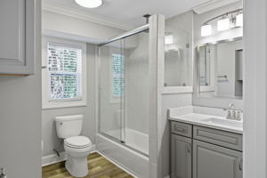 Comination shower/bath serves the bunkroom.