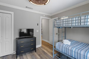 Large closet and dresser serves the bunk room.