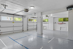 A two-car garage w/ plenty of storage underneath the house.