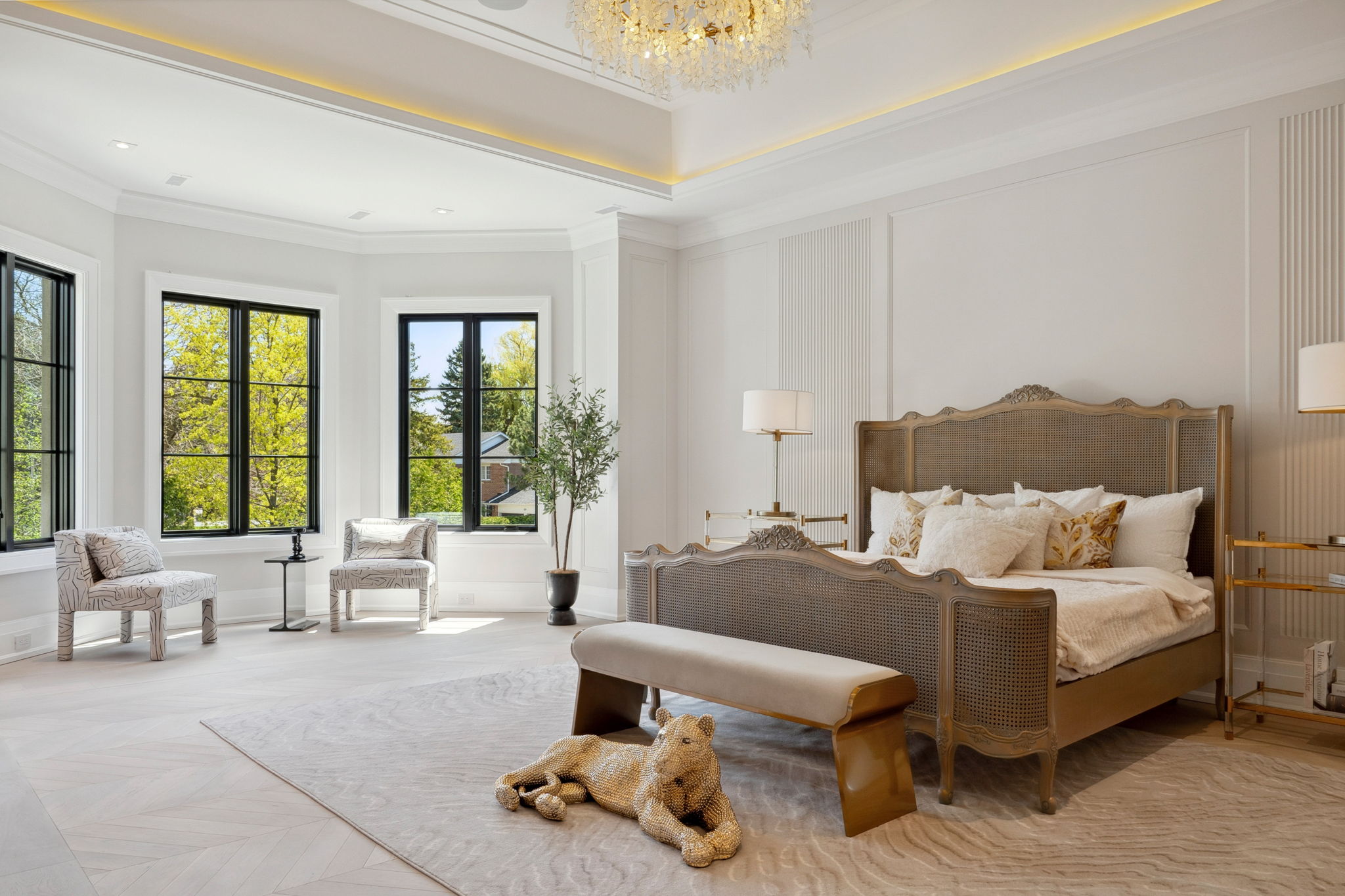 Primary Suite with ornate headboard at 1 Sunflower Court. Site by cranemedia.com, Photo by amazingphotovideo.com