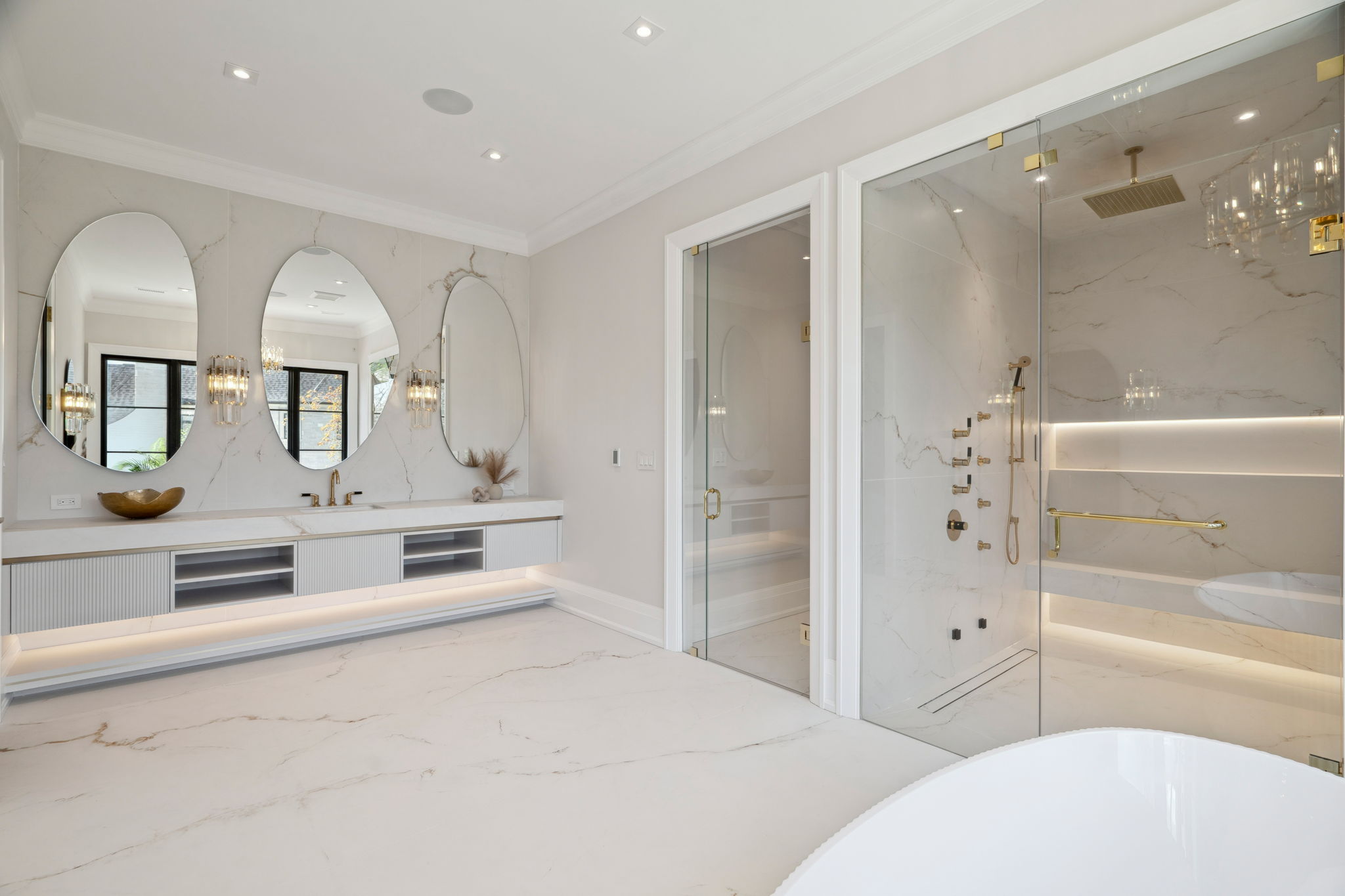 Primary bathroom detail showcasing Rafael Gomes's quiet luxury at 1 Sunflower Court. Photo by amazingphotovideo.com, site by cranemedia.com