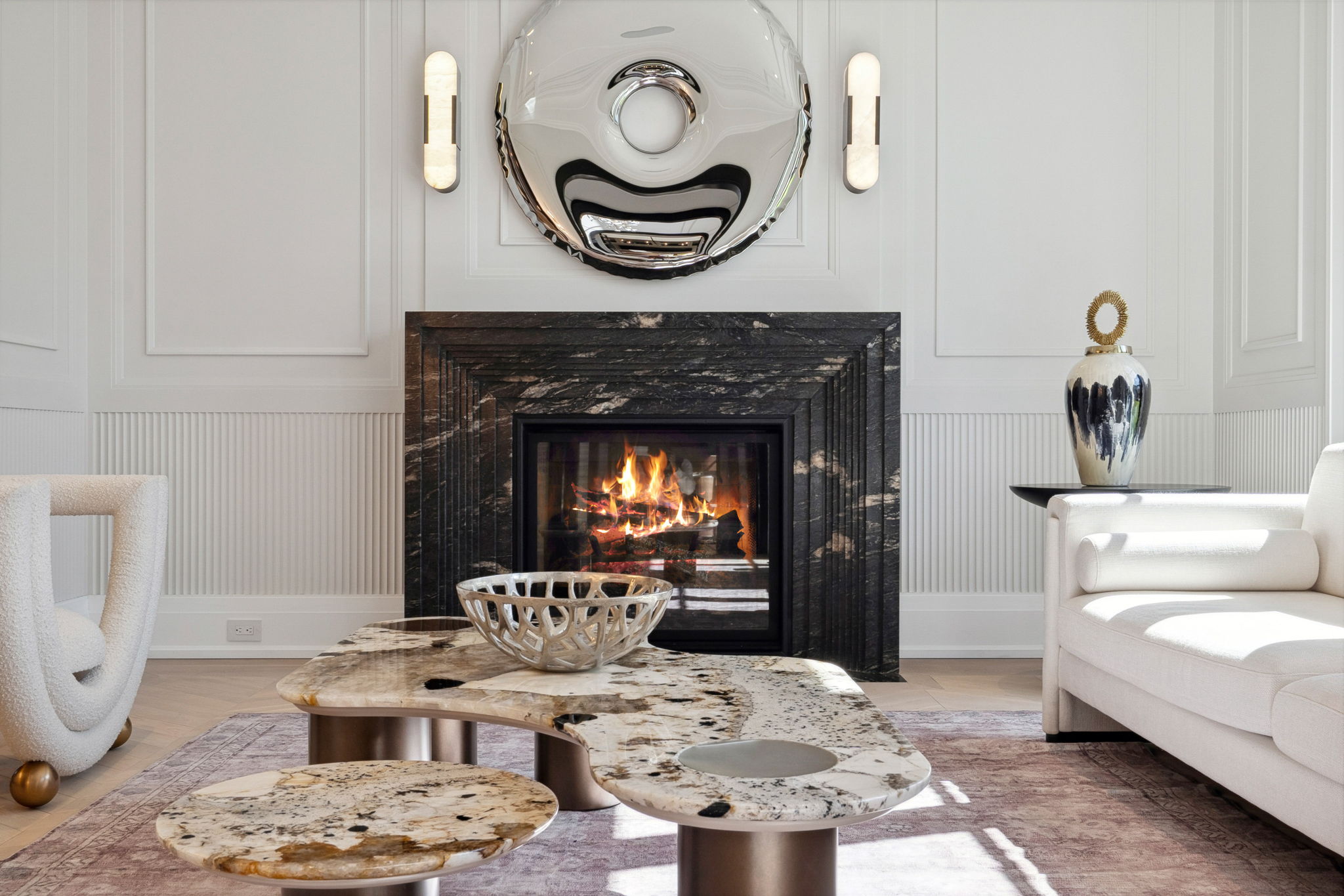 Living room fireplace detail showcasing Rafael Gomes's interior artistry. Photo by amazingphotovideo.com, site by cranemedia.com