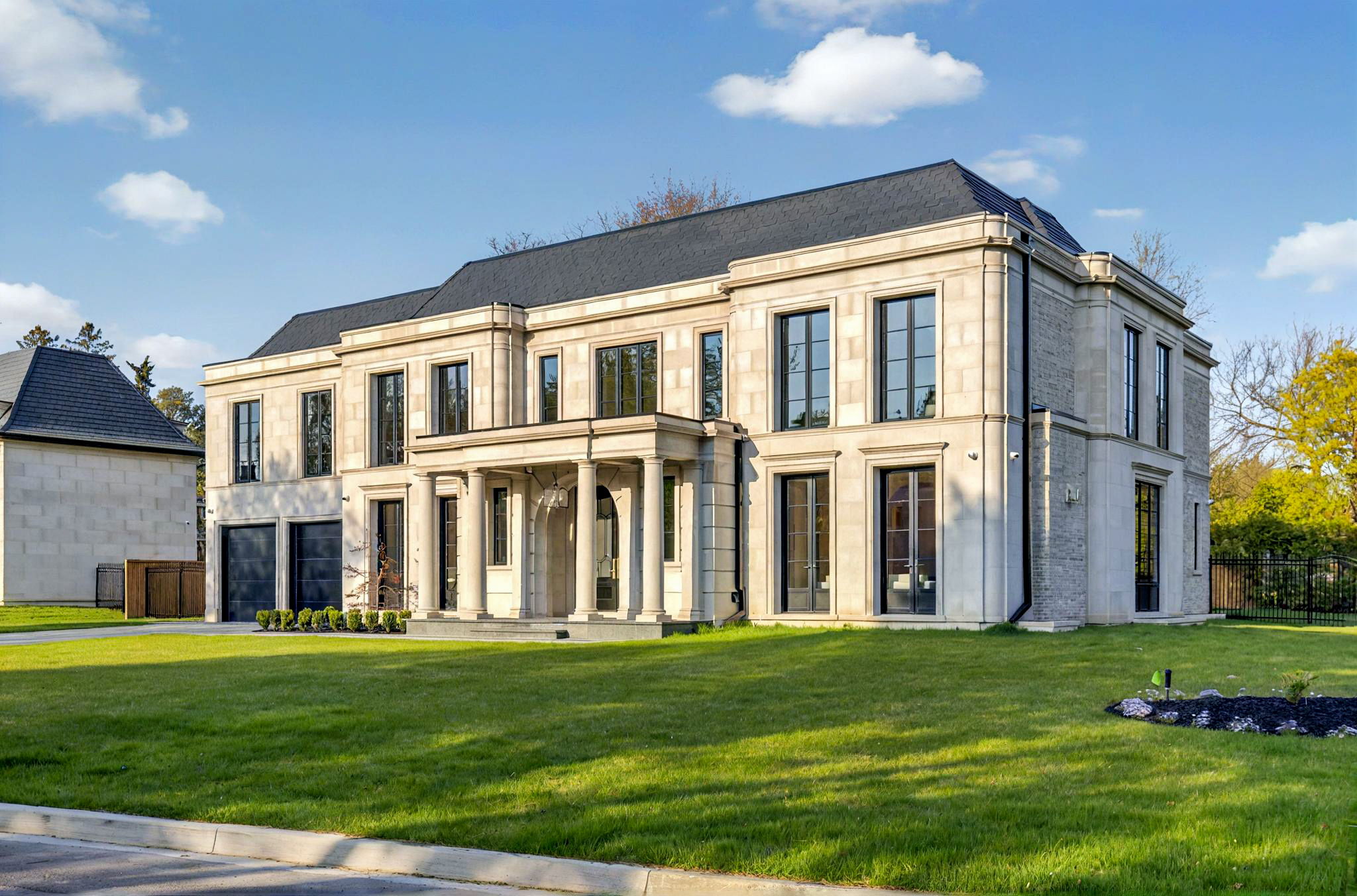 Richard Wengle Architecture: Grand light-stone mansion facade of 1 Sunflower Court. Site by cranemedia.com, Photo by amazingphotovideo.com