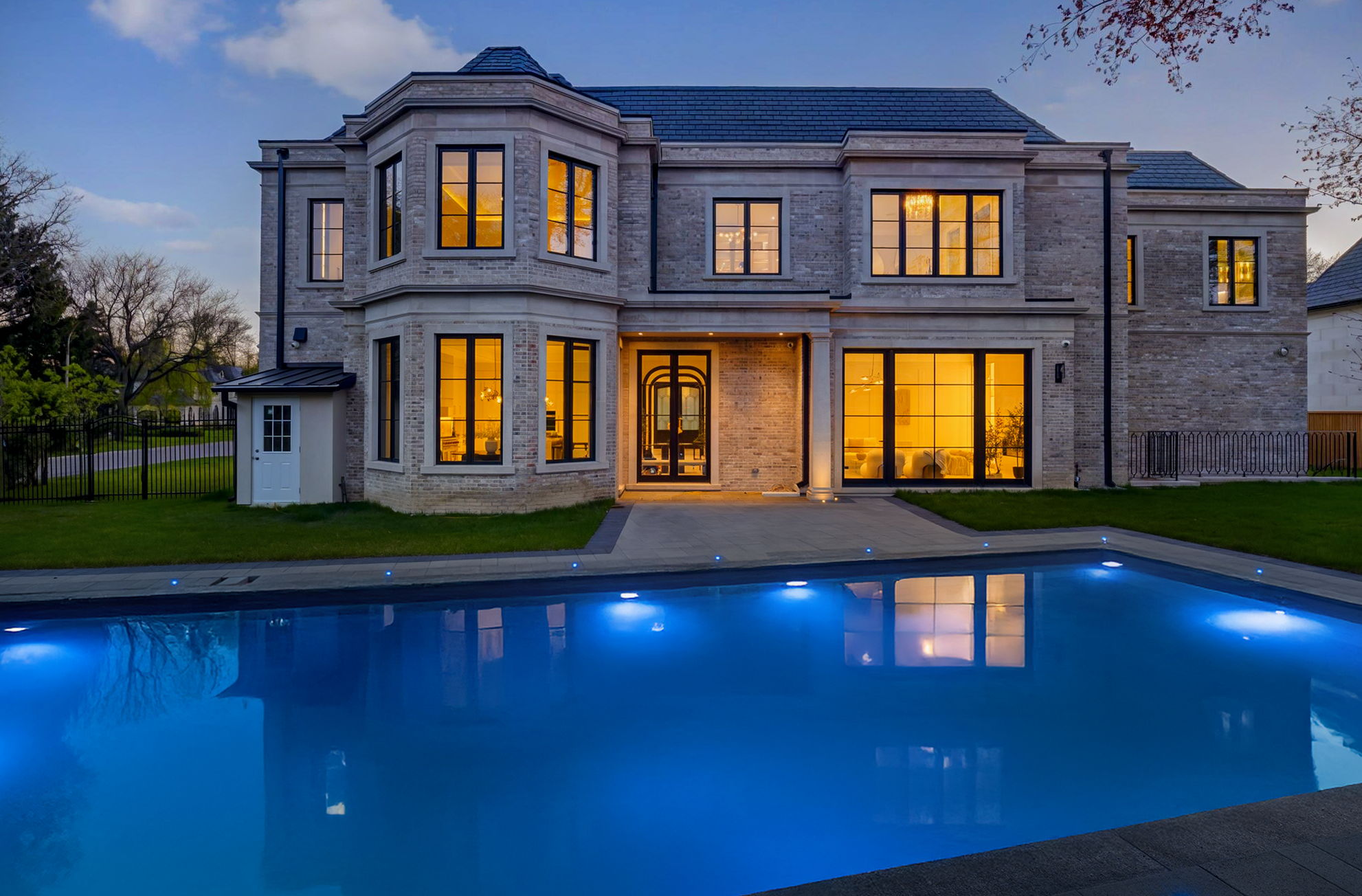 Backyard Oasis with pool at dusk, 1 Sunflower Court. Site by cranemedia.com, Photo by amazingphotovideo.com
