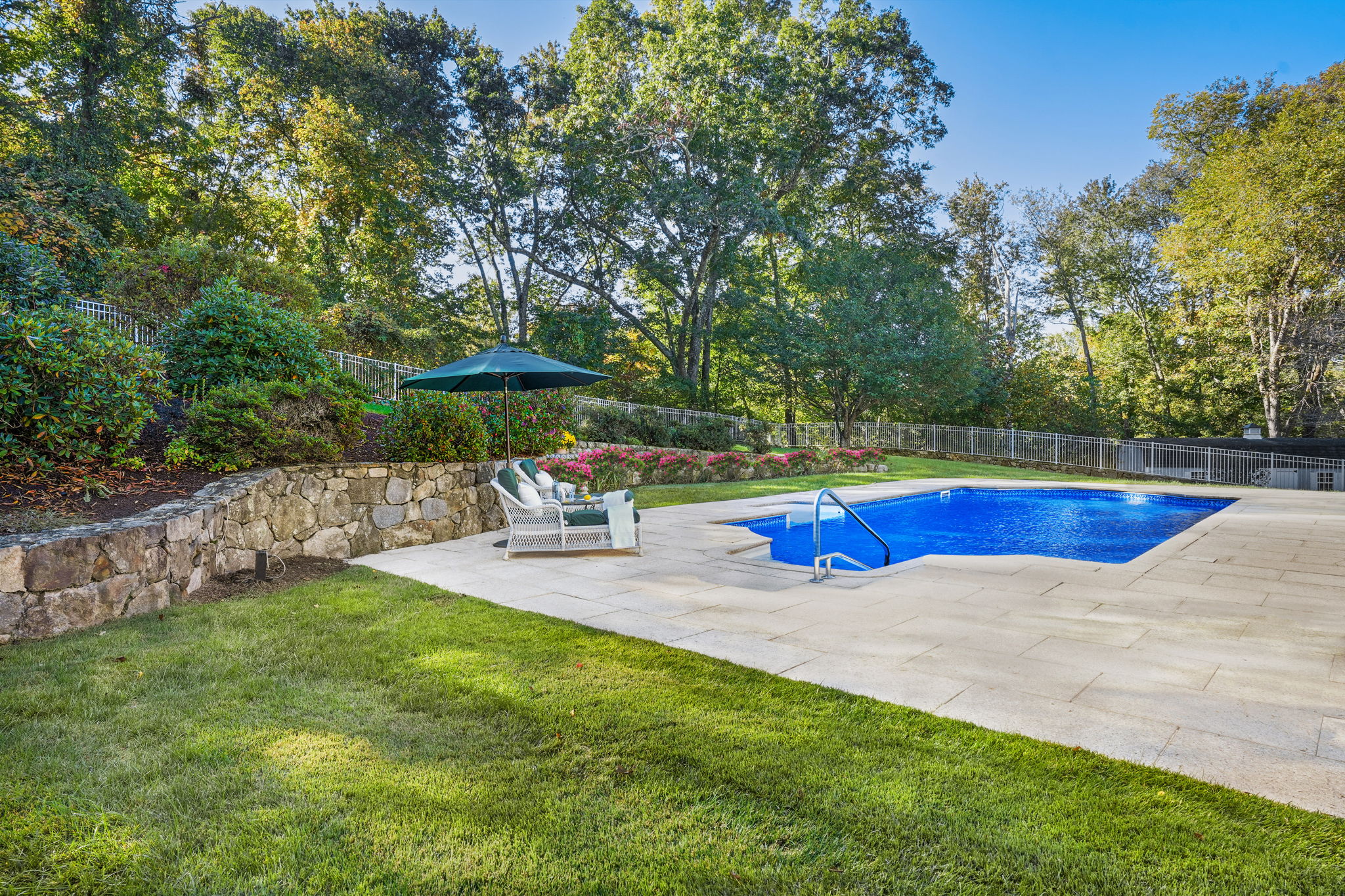 Relax and enjoy this heated in-ground pool.