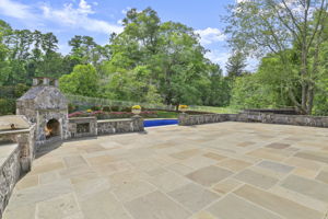 A sizable patio with a wood-burning fireplace and built-in grill.  You'll never have to leave your own little sanctuary!