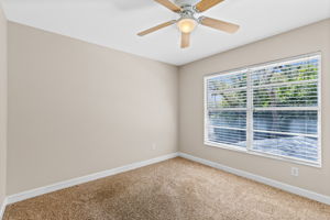 Spacious feel and natural light in the rear bedroom