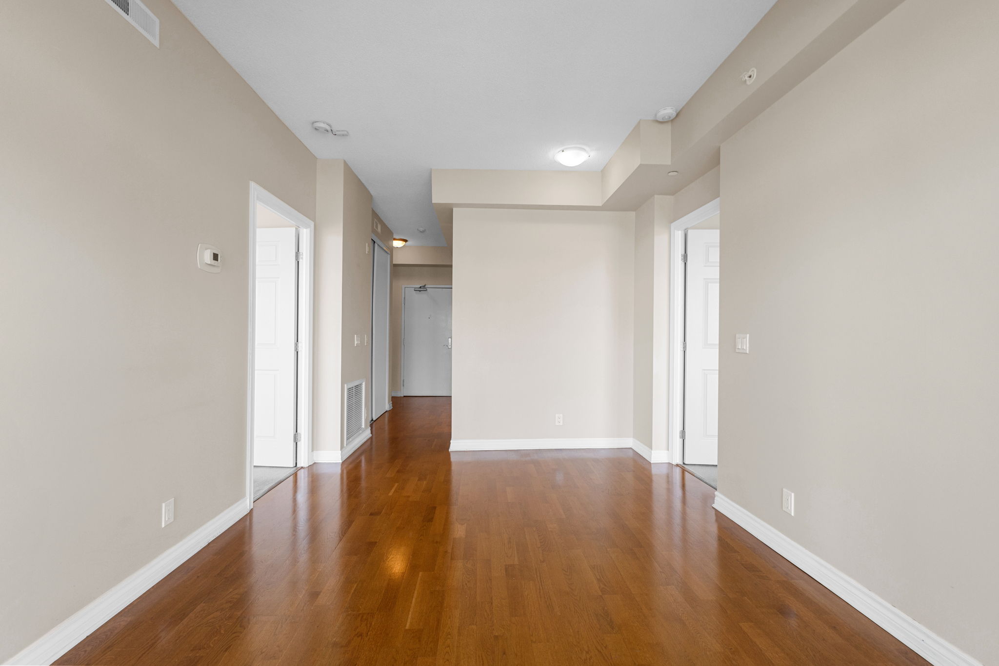 Central living space with bedrooms off each side