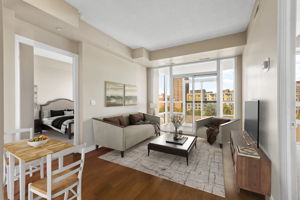 Living room with dining space (virtually staged)