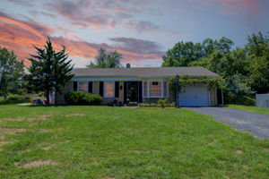 21 EXT FRONT HOUSE- Twilight