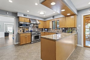 Updated Kitchen with Granite and Stainless