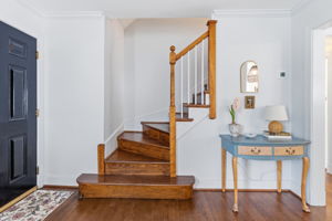 Beautifully refinished hardwood floors welcome you into the living room.