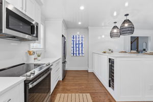 This spacious and bright kitchen was meticulously thought out and opened up to maximize flow and space.