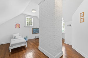 2nd floor bedroom has plenty of space & a built in desk at the front window eave area.