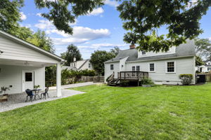 Multiple crawl space entries with window well style drainage systems & numerous outdoor living spaces.