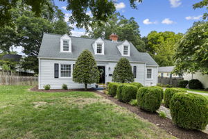 Mature landscaping with established mulch beds & beautiful tree coverage.
