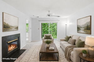Living Room with Fireplace and Access to Deck