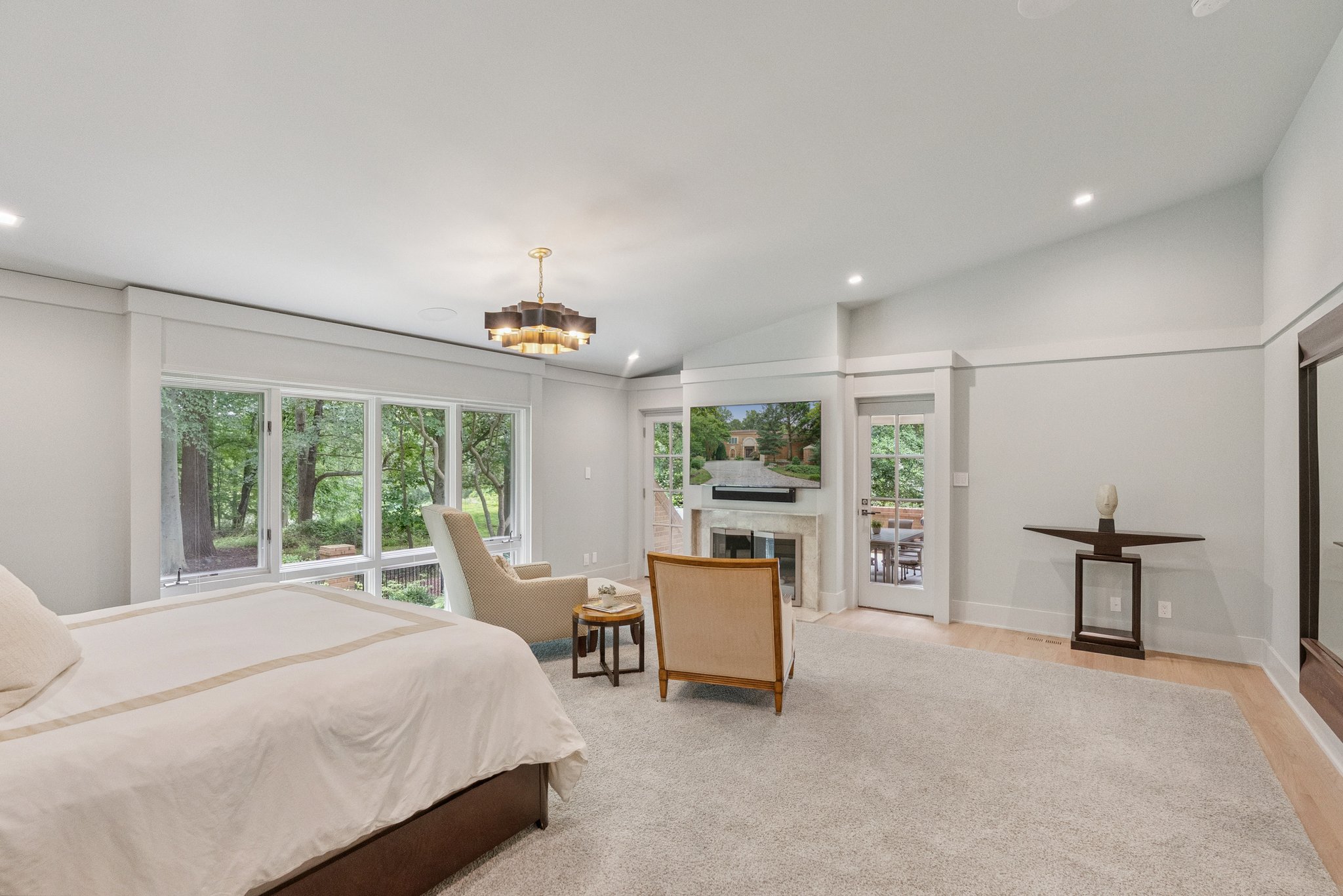 Primary Retreat with Gas Fireplace and Terrace Access