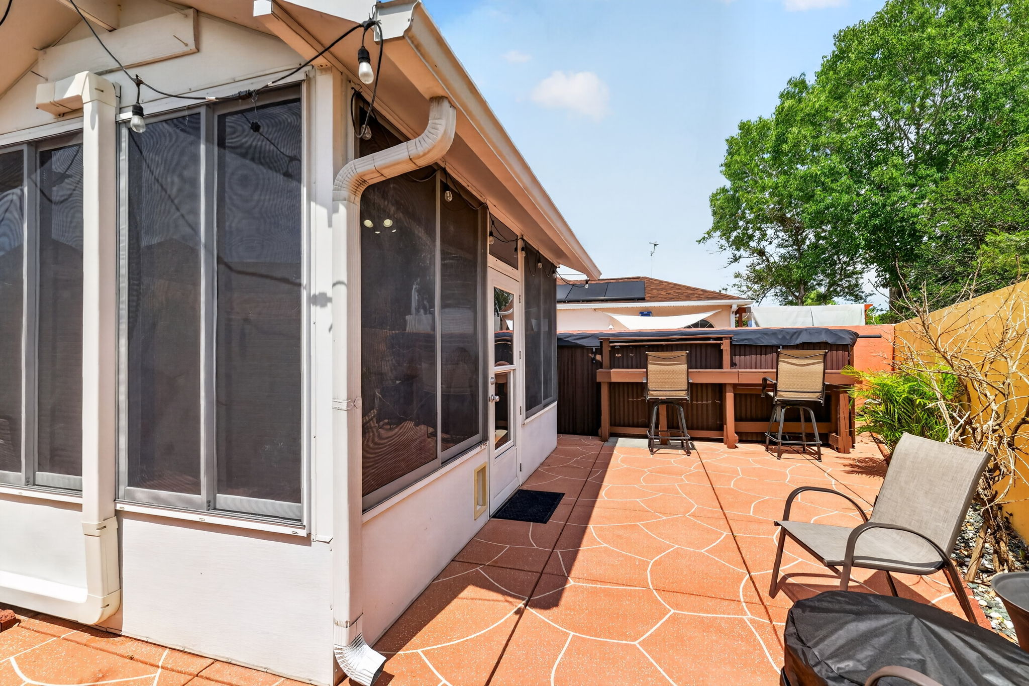 Rear Courtyard with SWIM SPA and BAR!