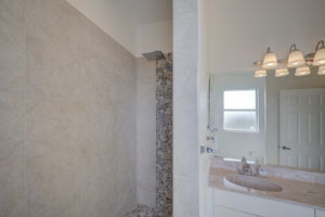 Walk in shower with multiple shower heads