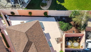 Aerial of Rear and Side Courtyards with ROOM FOR A POOL!