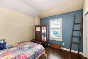 Upstairs bedroom with accent wall