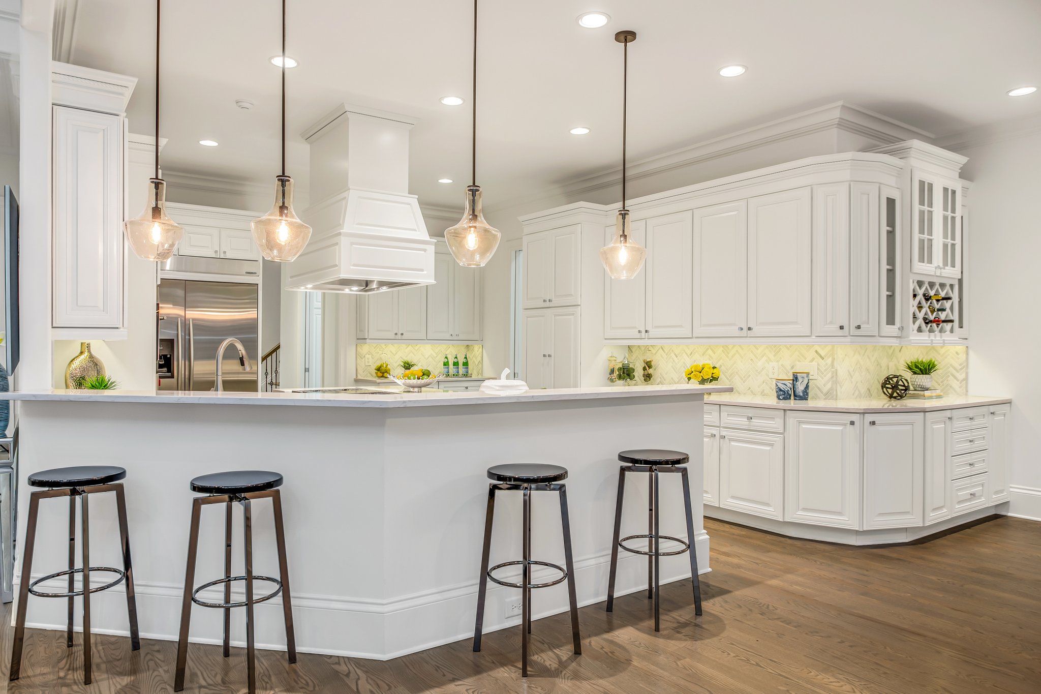 Quartz countertops, marble backsplash