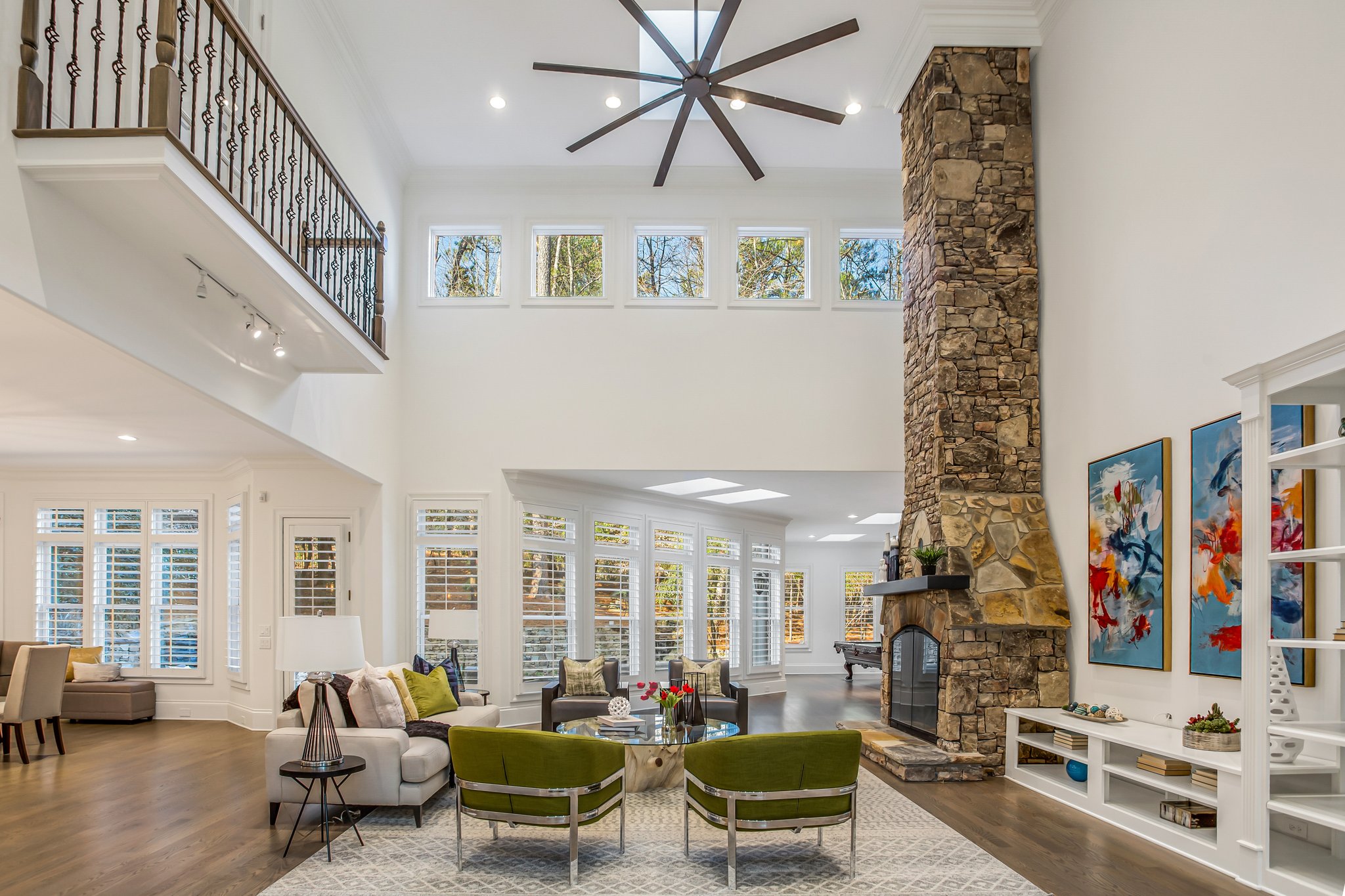 The 2-story great room with 22-foot stone fireplace.