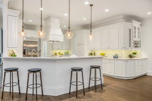 Quartz countertops, marble backsplash