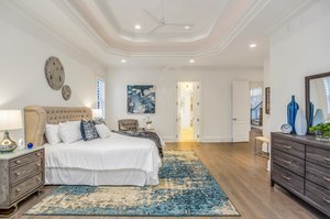 Reverse views showcases trey ceiling with inset lighting