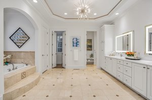 The massive bath area--with his and her lavatories!
