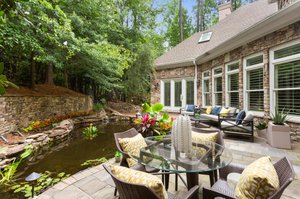 The gorgeous slate patio--up above is a huge yard with natural landscaping