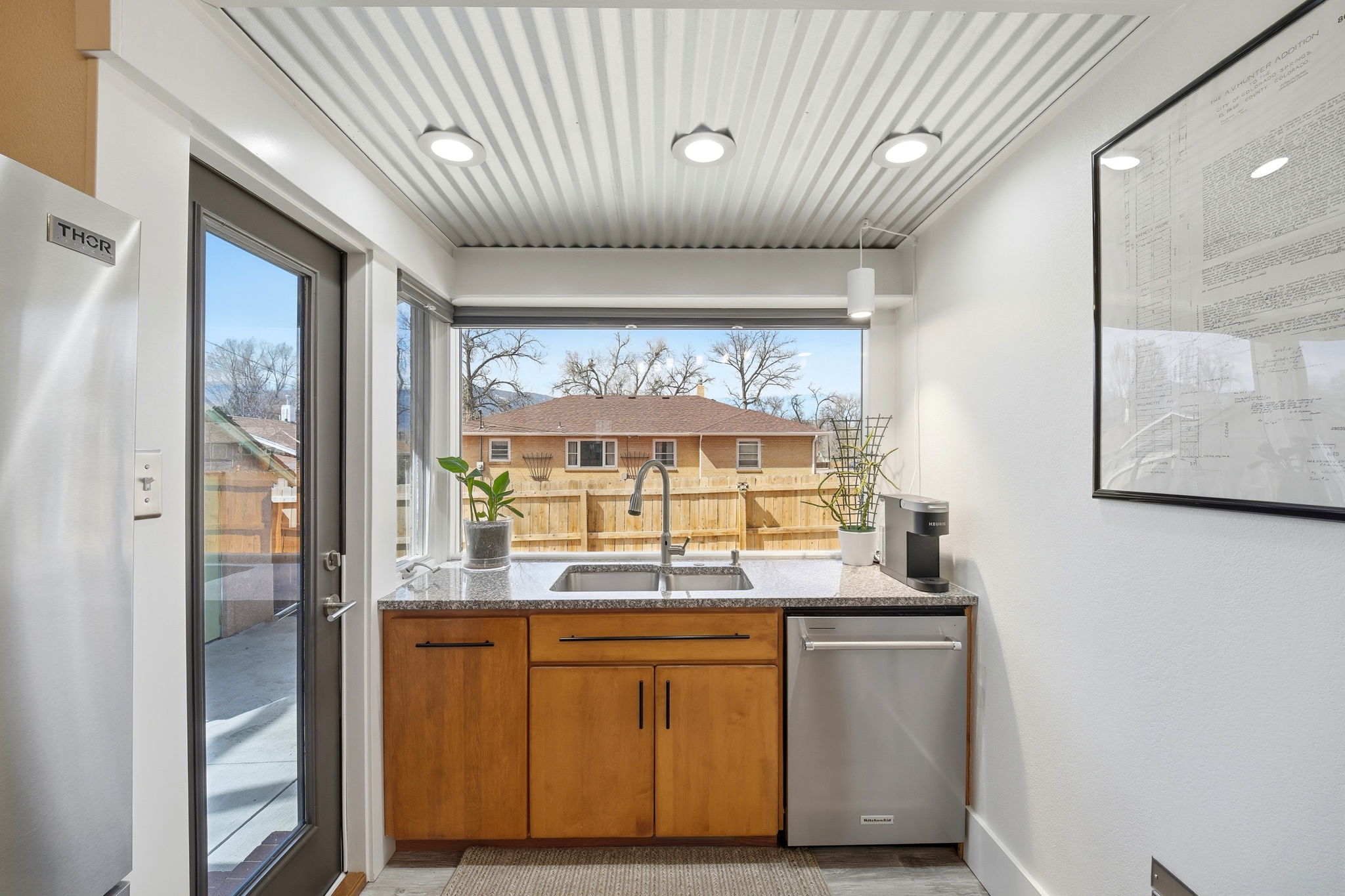 Oversized Windows over Kitchen Sink
